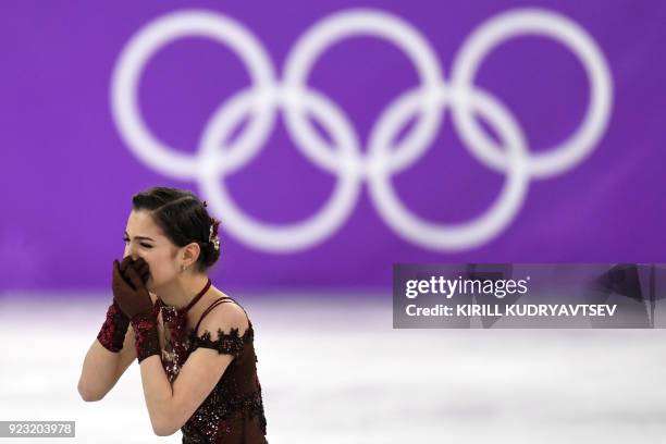 Russia's Evgenia Medvedeva reacts after competing in the women's single skating free skating of the figure skating event during the Pyeongchang 2018...