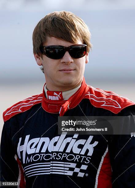 Landon Cassill, driver of the Miccosukee Indiana Gaming & Resort Chevrolet stands on the grid during qualifying for the NASCAR Nationwide series...