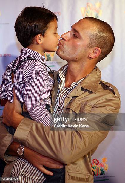 Photographer Nigel Barker and son attend the Elizabeth Glaser Pediatric AIDS Foundation "Kids for Kids Family Carnival" at Industria Superstudio on...