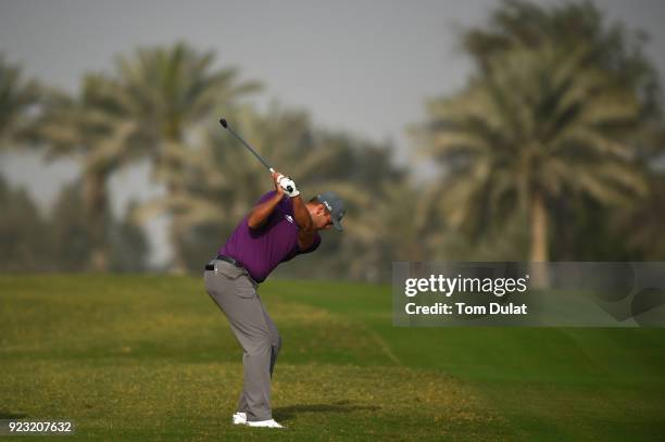 Jonathan Thomson of England hits an approach shot on the 5th hole during the second round of the Commercial Bank Qatar Masters at Doha Golf Club on...