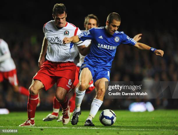 Joe Cole of Chelsea holds off Ryan Nelsen of Blackburn Rovers during the Barclays Premier League match between Chelsea and Blackburn Rovers at...