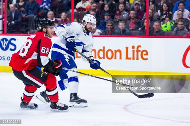 Tampa Bay Lightning Right Wing Nikita Kucherov takes a shot as Ottawa Senators Left Wing Mike Hoffman looks on during first period National Hockey...