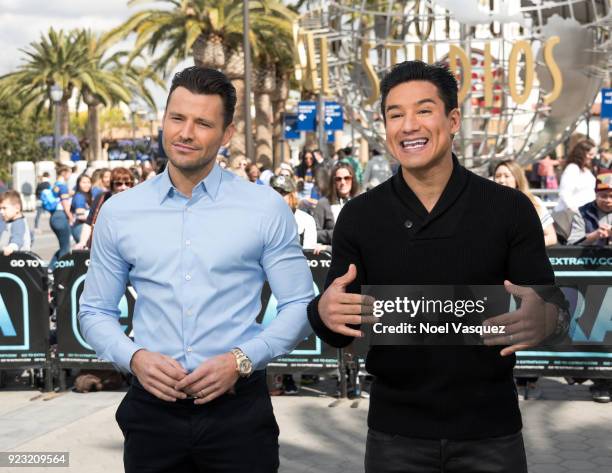 Mark Wright and Mario Lopez visit "Extra" at Universal Studios Hollywood on February 22, 2018 in Universal City, California.