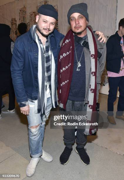 Artists Justin Abbink and Damian7thletter pose for portrait at the opening reception for Vhil's "Annihilation" exhibit at Over The Influence on...