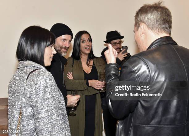 S Falk Lehmann and Jasmin Siddiqui speak with Shepard Fairey at the opening reception for Vhil's "Annihilation" exhibit at Over The Influence on...