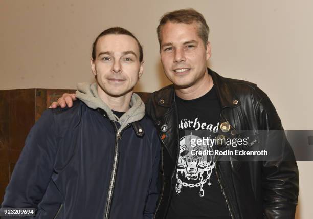 John Winthrop Tracy and Shepard Fairey pose for portrait at the opening reception for Vhil's "Annihilation" exhibit at Over The Influence on February...