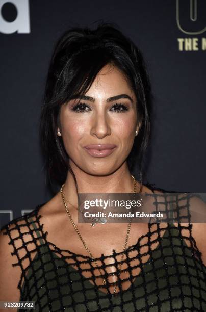 Actress Liana Mendoza arrives at the premiere of USA Network's "Unsolved: The Murders of Tupac and The Notorious B.I.G." at Avalon on February 22,...