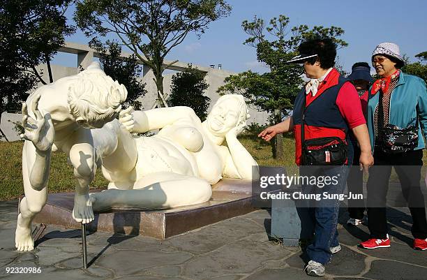 People visit the theme park 'Love Land' on October 24, 2009 in Jeju, South Korea. Love Land is an outdoor sex-themed sculpture park which opened in...