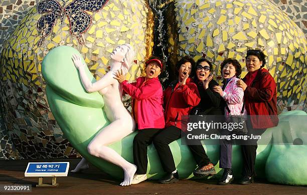 People visit the theme park 'Love Land' on October 24, 2009 in Jeju, South Korea. Love Land is an outdoor sex-themed sculpture park which opened in...