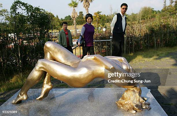 People visit the theme park 'Love Land' on October 24, 2009 in Jeju, South Korea. Love Land is an outdoor sex-themed sculpture park which opened in...