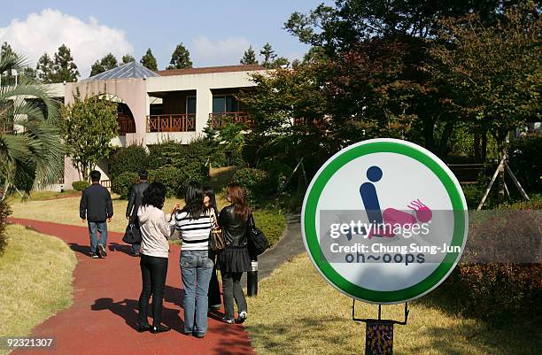 People visit the theme park 'Love Land' on October 24, 2009 in Jeju, South Korea. Love Land is an outdoor sex-themed sculpture park which opened in...