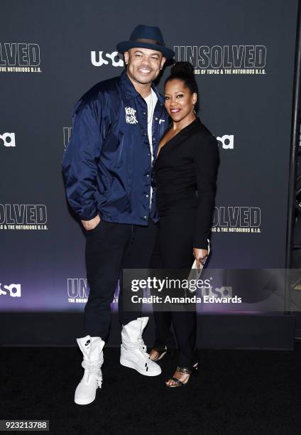 Director Anthony Hemingway and actress Regina King arrive at the premiere of USA Network's "Unsolved: The Murders of Tupac and The Notorious B.I.G."...