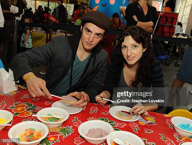 Actor Matthew Settle and Sarah Hughes attend the Elizabeth Glaser Pediatric AIDS Foundation "Kids for Kids Family Carnival" at Industria Superstudio...