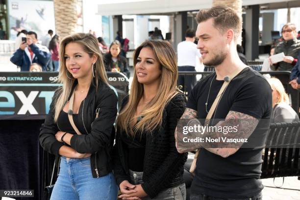 Maddy Burciaga, Sarah Martins and Steven Bachelard visit "Extra" at Universal Studios Hollywood on February 22, 2018 in Universal City, California.