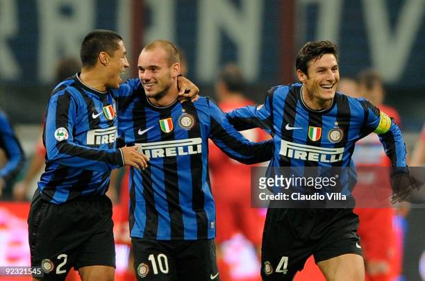 Wesley Sneijder , Ivan Ramiro Cordoba and Javier Zanetti of FC Internazionale Milano celebrate after the second goal during the Serie A match between...