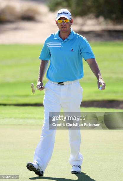 Greg Owen of England reacts after making a birdie putt on the second hole during the third round of the Frys.com Open at Grayhawk Golf Club on...