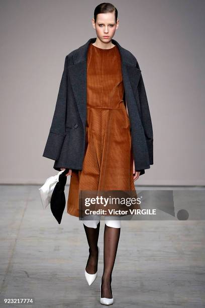 Model walks the runway at the Lucio Vanotti Ready to Wear Fall/Winter 2018-2019 fashion show during Milan Fashion Week Fall/Winter 2018/19 on...