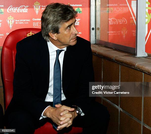 Real Madrid coach Manuel Pellegrini looks on before the La Liga match between Sporting Gijon and Real Madrid at El Molinon Stadium on October 24,...