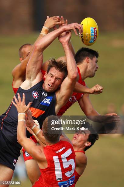 Lachie Keeffe of the Giants competes for the ball with the Swans defenders during the AFL Inter Club match between the Sydney Swans and the Greater...