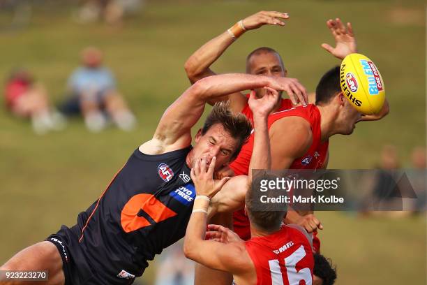 Lachie Keeffe of the Giants competes for the ball with the Swans defenders during the AFL Inter Club match between the Sydney Swans and the Greater...
