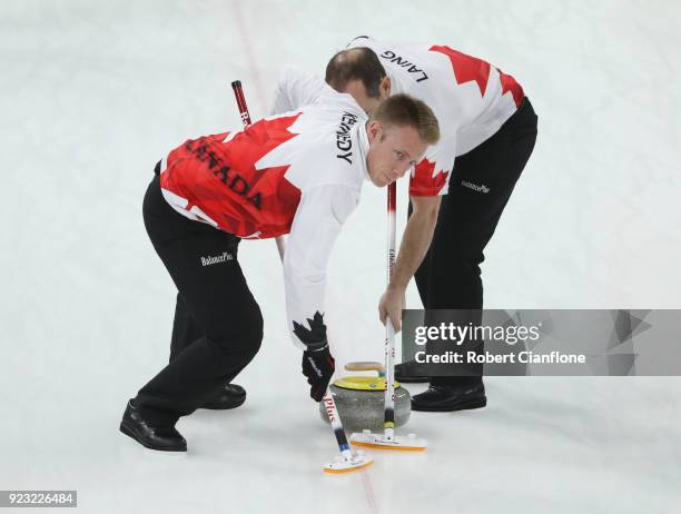 Marc Kennedy and Brent Laing of Canada compete during the Bronze Medal match between Canada and Switzerland on day fourteen of the PyeongChang 2018...