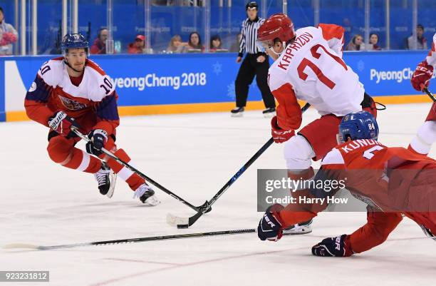 Kirill Kaprizov of Olympic Athlete from Russia controls the puck against Roman Cervenka and Tomas Kundratek of the Czech Republic in the first period...