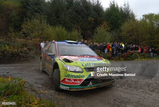 Mikko Hirvonen of Finland and Jarmo Lehtinen of Finland compete in their BP Abu Dhabi Ford Focus during Leg 2 of the WRC Wales Rally GB on on October...