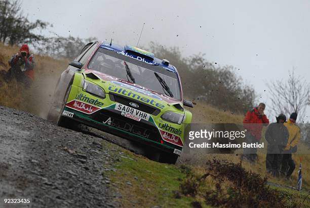 Mikko Hirvonen of Finland and Jarmo Lehtinen of Finland compete in their BP Abu Dhabi Ford Focus during Leg 2 of the WRC Wales Rally GB on on October...
