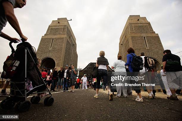 Families walk on the Bridge during a picnic breakfast on the Sydney Harbour Bridge on October 25, 2009 in Sydney, Australia. For the first time in...