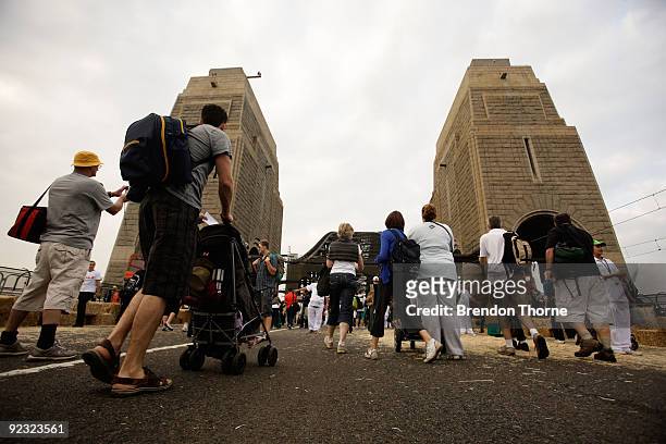 Families walk on the Bridge during a picnic breakfast on the Sydney Harbour Bridge on October 25, 2009 in Sydney, Australia. For the first time in...