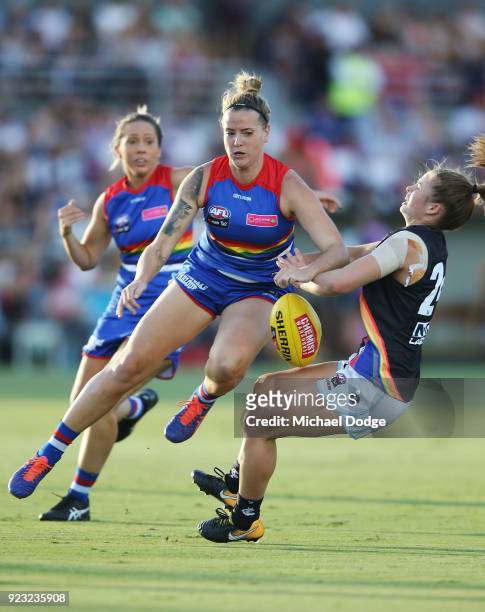 Reni Hicks of the Blues is hit hard by Hannah Scott of the Bulldogs during the round four AFLW match between the Western Bulldogs and the Carlton...