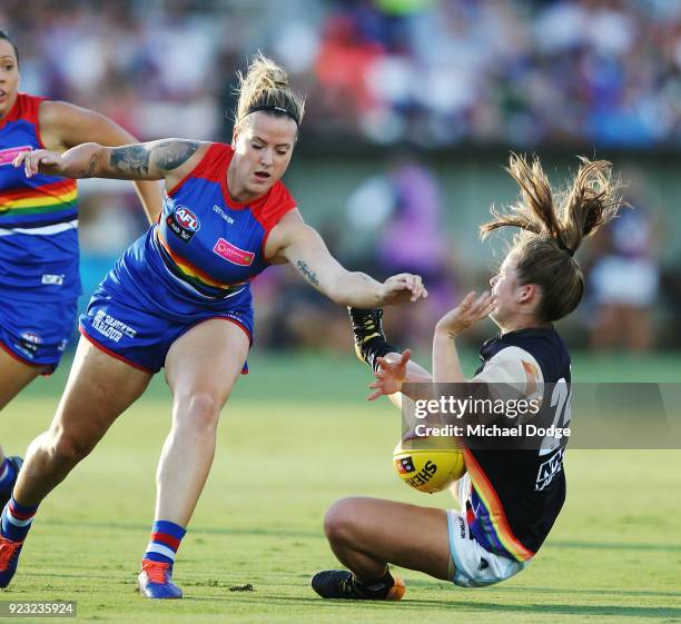 Reni Hicks of the Blues is hit hard by Hannah Scott of the Bulldogs during the round four AFLW match between the Western Bulldogs and the Carlton...