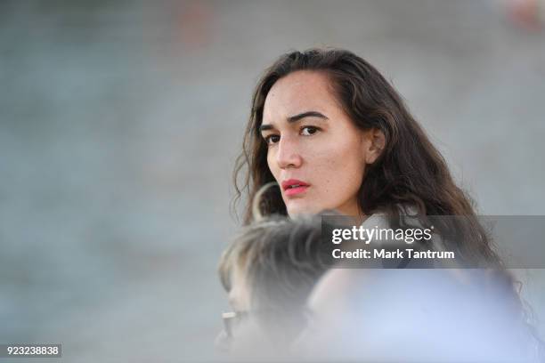 Spectator looks out at the performaces during NZ Festival Opening Night - A Waka Odyssey on February 23, 2018 in Wellington, New Zealand.