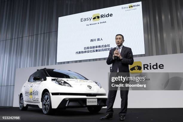 Hiroto Saikawa, president and chief executive officer of Nissan Motor Co., speaks during a news conference for the "Easy Ride" robot taxi service,...