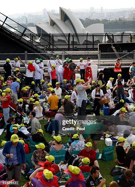 Picnic goers gather during a picnic breakfast on the Sydney Harbour Bridge on October 25, 2009 in Sydney, Australia. For the first time in its...