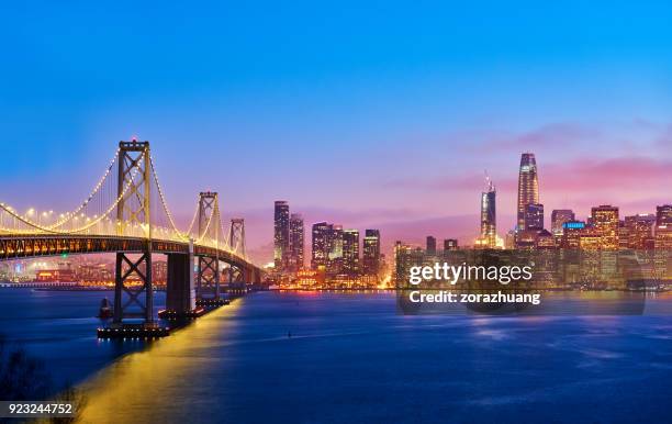 san francisco skyline at sunset, california, usa - bay bridge imagens e fotografias de stock