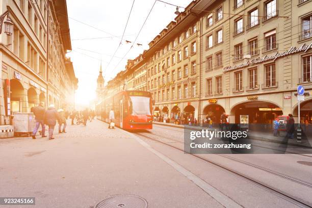 bern's old town and city traffic, switzerland - bern clock tower stock pictures, royalty-free photos & images