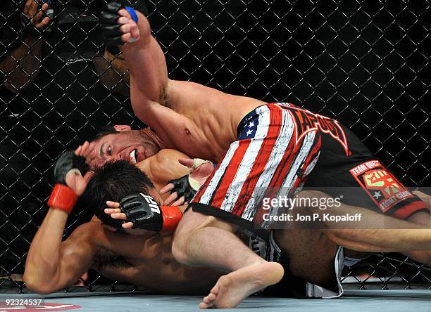 Fighter Chael Sonnen battles with UFC fighter Yushin Okami during their Middleweight bout at UFC 104: Machida vs. Shogun at Staples Center on October...