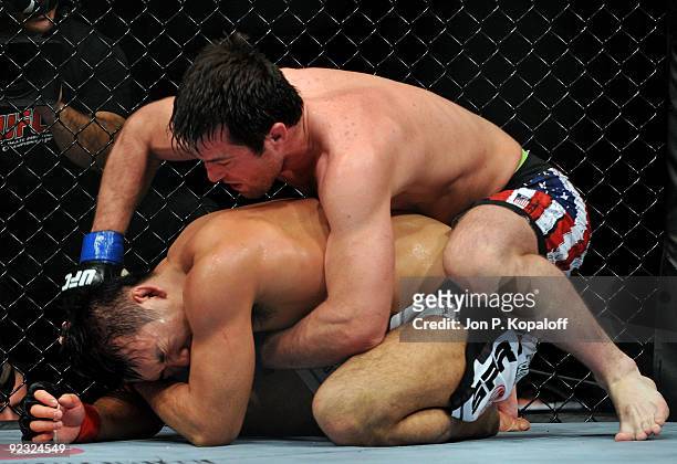 Fighter Chael Sonnen battles with UFC fighter Yushin Okami during their Middleweight bout at UFC 104: Machida vs. Shogun at Staples Center on October...