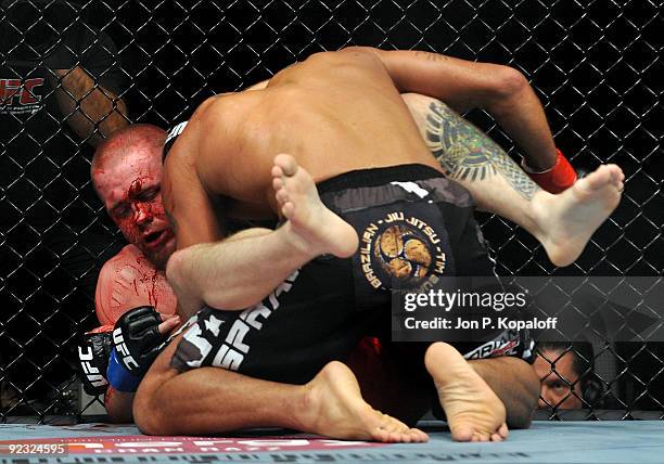Fighter Jorge Rivera battles with UFC fighter Rob Kimmons during their Middleweight bout at UFC 104: Machida vs. Shogun at Staples Center on October...