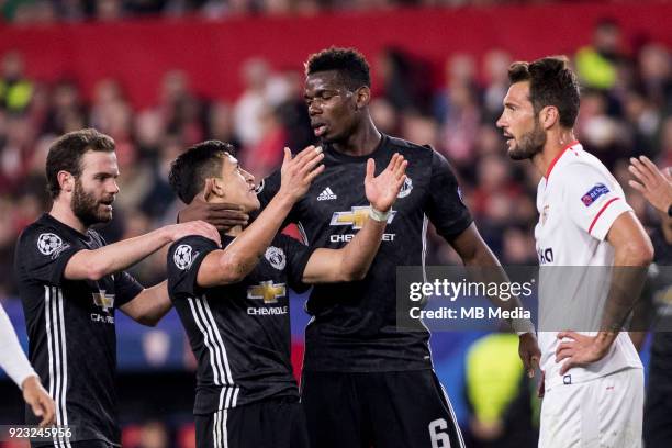 And PAUL POGBA argue after missing a chance at goal in front of FRANCO VAZQUEZ of Sevilla during the UEFA Champions League Round of 16 First Leg...