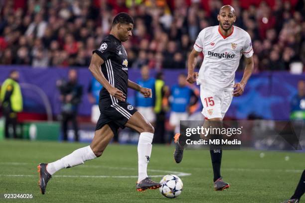 Of Manchester drives the ball in front of STEVEN N'ZONZI of Sevilla during the UEFA Champions League Round of 16 First Leg match between Sevilla FC...