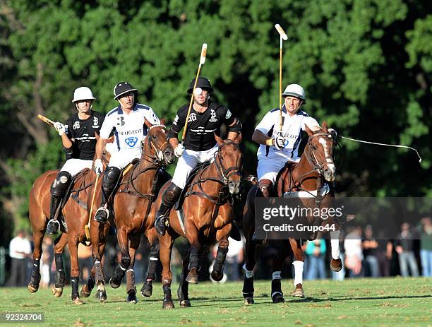 Ellerstina player Facundo Pieres conducts the ball against La Dolfina during their polo match on the semifinals of Hurlingham Cup on October 24, 2009...