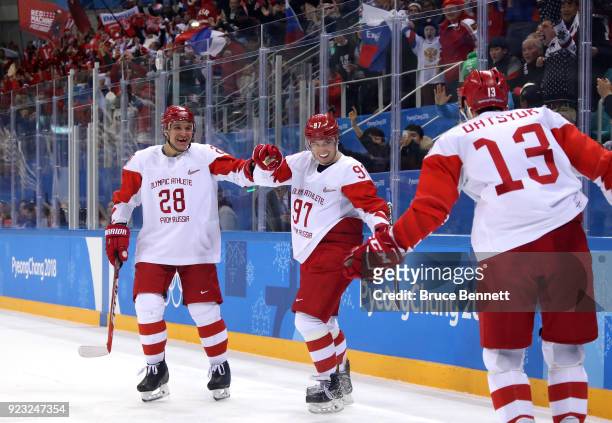 Nikita Gusev of Olympic Athlete from Russia celebrates with Andrei Zubarev and Pavel Datsyuk after scoring a goal in the second period against the...