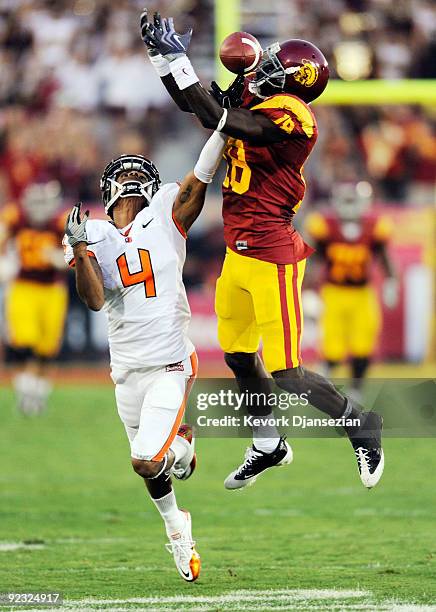 James Dockery of the Oregon State Beavers breaks up a pass intended for Damian Williams of the USC Trojans during the second quarter of the college...