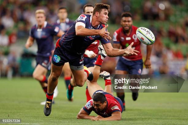 Tom English of the Rebels passes the ball during the round two Super Rugby match between the Melbourne Rebels and the Queensland Reds at AAMI Park on...