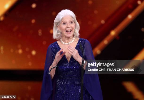 Austrian actress Christiane Hoerbiger speaks before receiving an award for lifetime achievement during the Golden Camera awards ceremony on February...