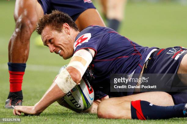 Dane Haylett-Petty of the Rebels scores a try with Tom English of the Rebels during the round two Super Rugby match between the Melbourne Rebels and...