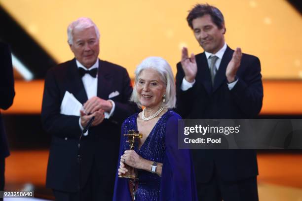 Christiane Horbiger receives her award on stage during the Goldene Kamera awards at Messehallen on February 22, 2018 at the Messe Hamburg in Hamburg,...