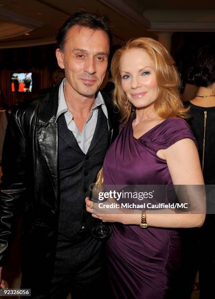 Actor Robert Knepper and actress Marg Helgenberger attend the Monte Carlo Television Festival cocktail party held at the Beverly Hills Hotel on...